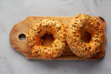 Homemade Pumpkin Seed Bagels Ready to Eat, top view. From above, overhead, flat lay.