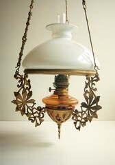 Hanging kerosene lamp with art nouveau ornament. Early 1900.    