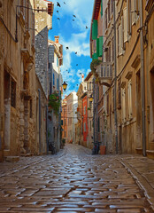 Street of Rovinj with calm, colorful building facades, Istria, Rovinj is a tourist destination on Adriatic coast of Croatia.Traveling concept background