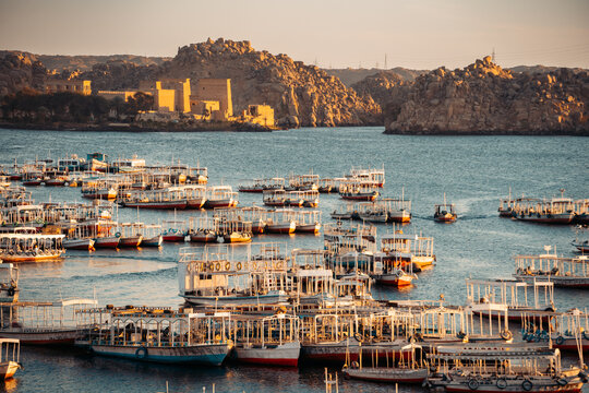 Boats on Nile River & Philae Temple, Aswan Egypt