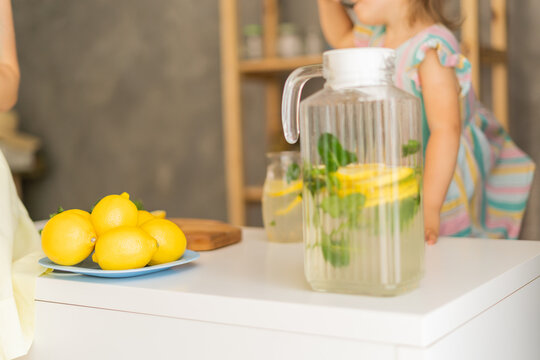 lemonade on the background of a jug of lemonade