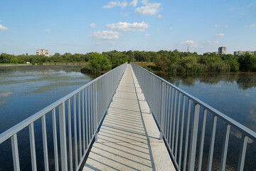 Foot bridge over the lake in Ivano-Frankivsk city in western Ukraine