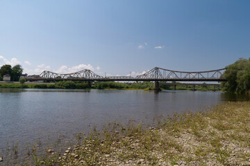 Old metal bridge across Dniester river in the city of Halych, western Ukraine