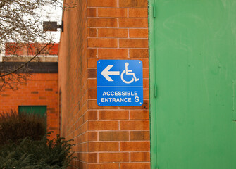 Handicap sign showing reserved street parking symbolizing disability and mobility problems showing accessibility and safety 