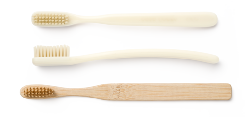 three toothbrushes isolated over a transparent background, lifestyle or personal care design elements, flat lay / top view