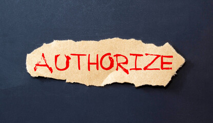 the word authorized is written a white sheet of paper which lies