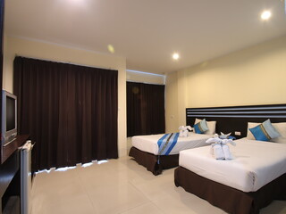 Decorated single bedroom with bed nice colours