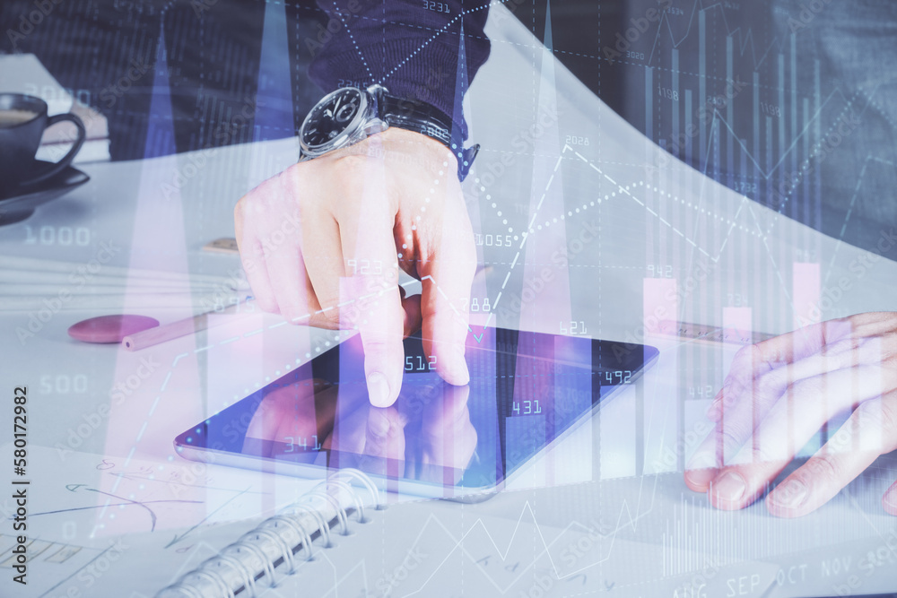 Poster Double exposure of man's hands holding and using a digital device and forex graph drawing. Financial market concept.