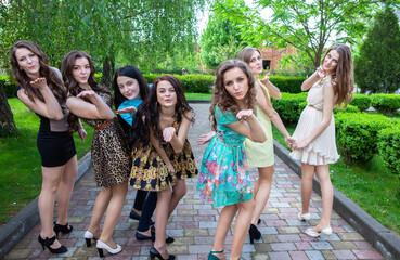 Fototapeta premium air kiss from group happy students