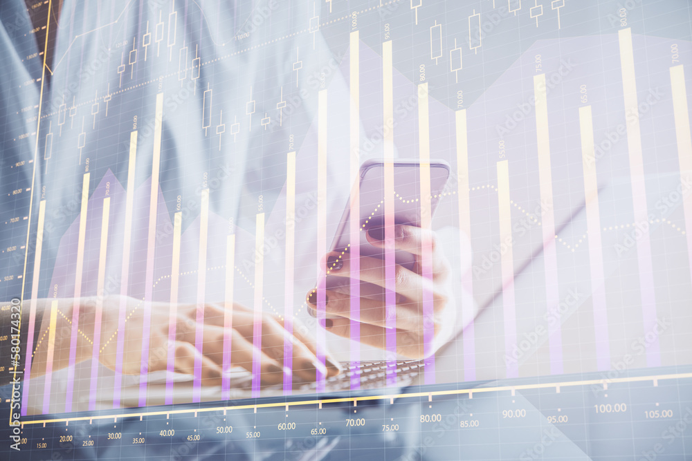 Poster double exposure of financial graph sketch hologram and woman holding and using a mobile device. stoc
