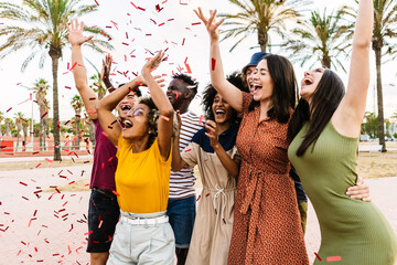 Group of young friends laughing and celebrating all together at beach summer party - Friendship and vacation lifestyle concept - obrazy, fototapety, plakaty