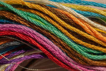 Mixed colors of thread create a textured twist for textile craft inspiration.