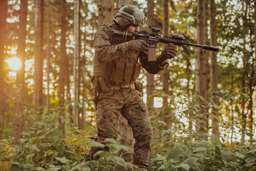 A modern warfare soldier on war duty in dense and dangerous forest areas. Dangerous military rescue operations