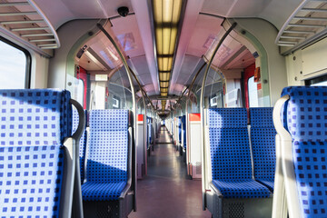 Naklejka premium inside view with empty seats of a train