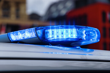 illuminated blue light on a German polic car