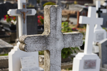 concrete tombstone on a cemetery