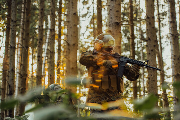 A modern warfare soldier on war duty in dense and dangerous forest areas. Dangerous military rescue...