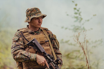 A soldier fights in a warforest area surrounded by fire