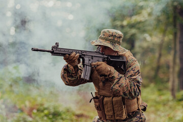 Fototapeta premium A modern warfare soldier on war duty in dense and dangerous forest areas. Dangerous military rescue operations