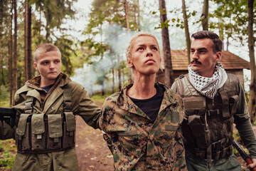 Fototapeta premium Terrorists was capture alive woman soldier and interrogation her on special tactics violent way