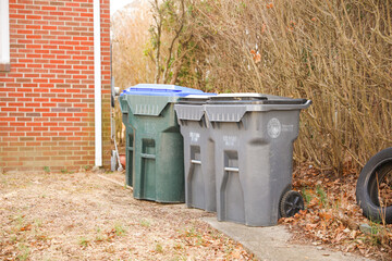 Trashcan and garbage bin outdoor in the street symbolizing environmental protection recycling and disposal in public due to pollution