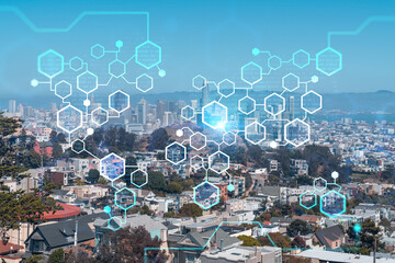Panoramic view of San Francisco skyline at daytime from hill side. Financial District, residential neighborhoods. Decentralized economy. Blockchain, cryptography and cryptocurrency concept, hologram