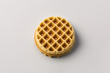 A round waffle isolated on white background