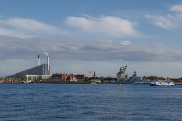 Naklejka premium Outdoor exterior view cityscape along waterfront and background of The historic warships on Holmen,The floating museum of Copenhagen at Nyholm and CopenHill.