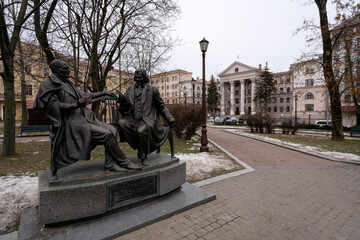 Monument to the creators of the Belarusian National classical Opera composer Stanislav Monyushko and playwright Vincent Dunin-Marcinkevich in the square near the Town Hall, Minsk, Belarus - obrazy, fototapety, plakaty