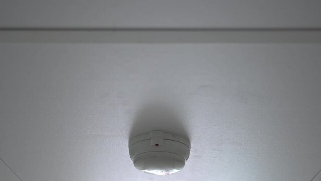 Close up of white Smoke Alarm.