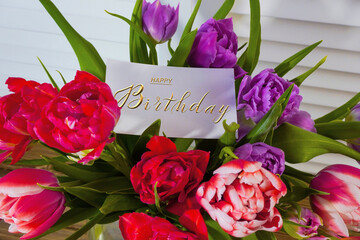 postcard , Internet banner  with a birthday greeting, with the inscription - happy birthday,  a bouquet of flowers with a note of congratulations