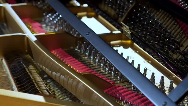 open piano inside view of the strings