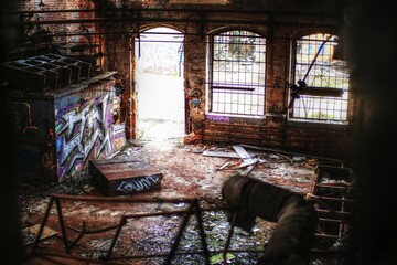 View over ruined factory interior full of debris