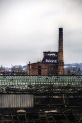 Power house of a huge former railway workshop in Germany, with big smokestack