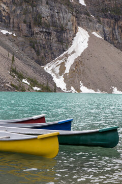 Canoes moored on Moraine Lake at Banff National Park