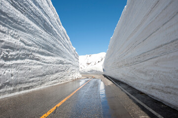 Tateyama Kurobe Alpine Route against clear sky during winter