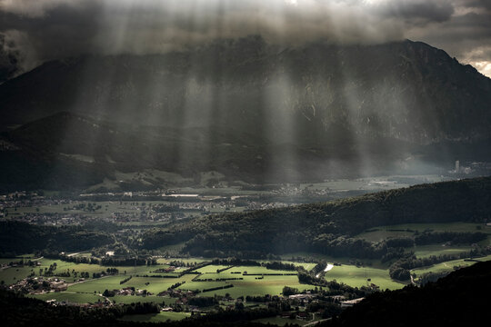 Scenic view of sunlight falling on landscape