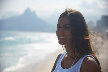 Cheerful woman looking at view