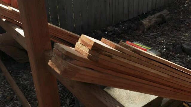 Pickets Lined Up As Man Starts Working On Building Fence