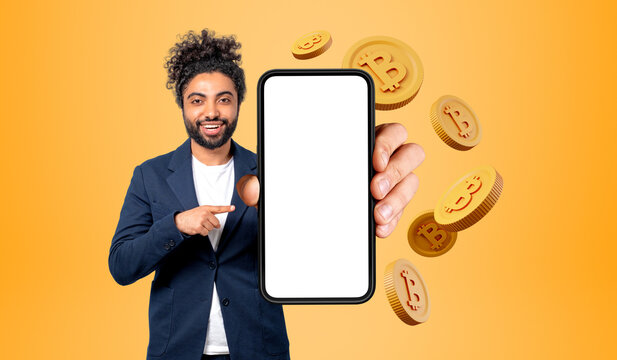 Arab businessman with mock up phone display, bitcoin and digital