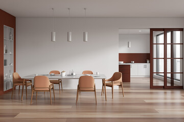 White and brown dining room and kitchen