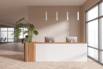 Modern reception interior desk with two computers, panoramic window