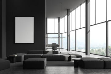 Gray office lounge with sofa and poster