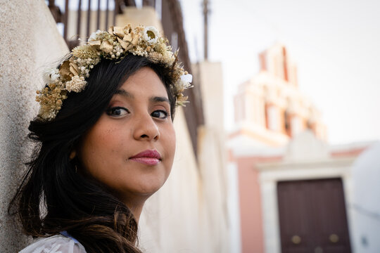 Lady with a crown of flowers