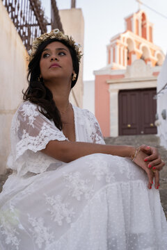 Lady in white dress in the stairs