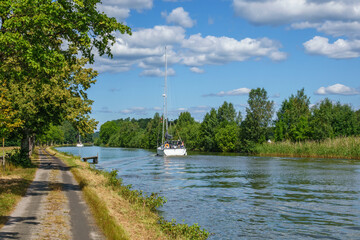 Boats on a canal in a beautiful summer landscape