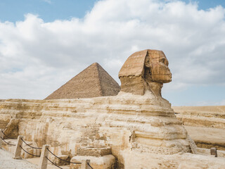 Giza pyramid complex. Photo of pyramids on a clear, sunny day against a blue sky. Vacation and travel concept