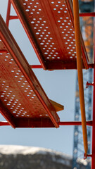 red perforated sheet metal scaffolding, For the construction - 580263517