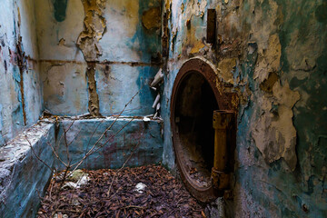 Destroyed airlocks of a military secret abandoned bunker. Background