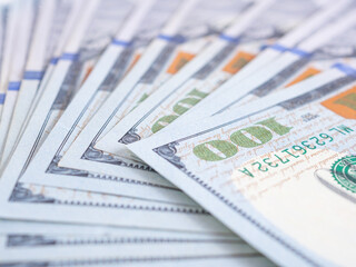 Close up, American one hundred dollar banknote. Selective focus at number 100. Background money. Business and finace..